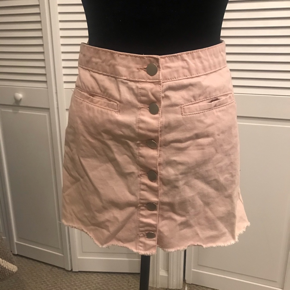 Pink denim mini skirt